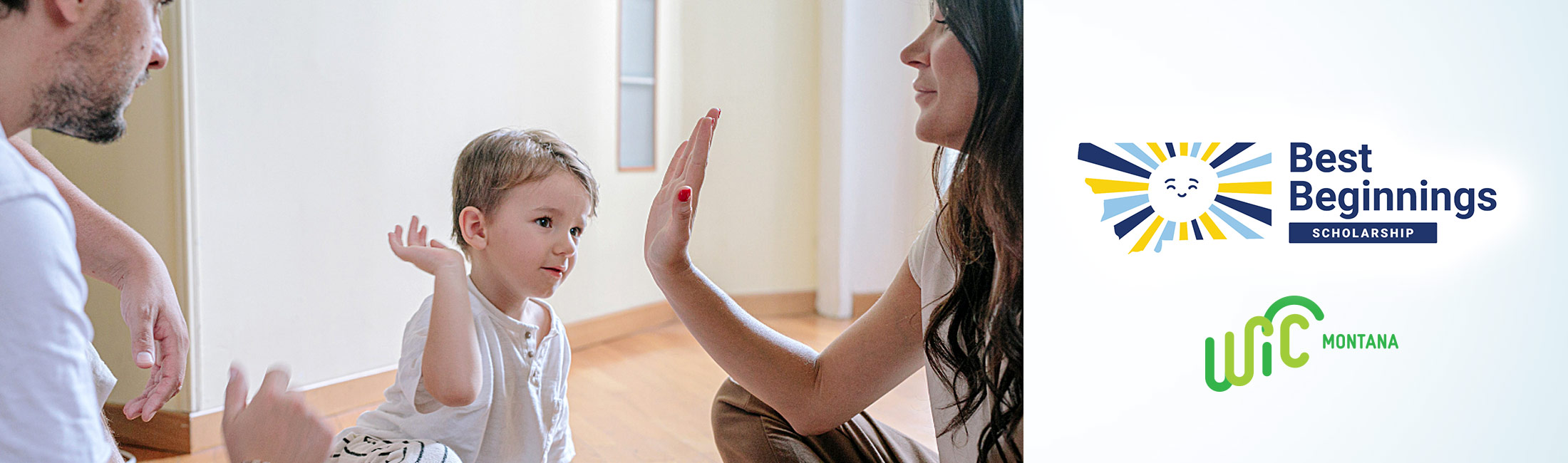 child giving high five to woman