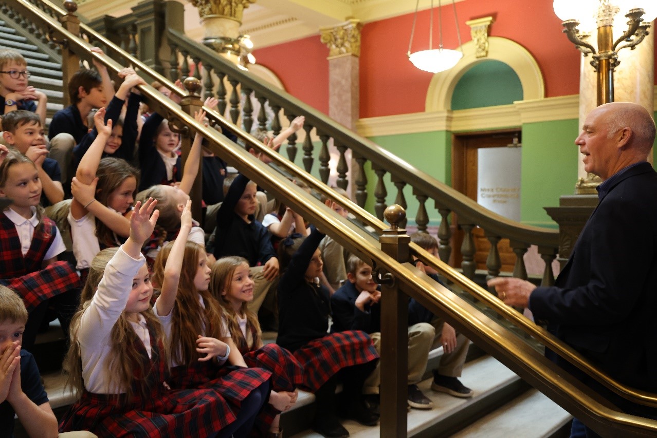 Gov. Gianforte speaking with children in the St. Andrew’s Youth Choir